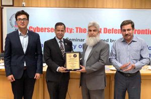 Vice Chancellor CUST Dr. Mansoor Ahmad presenting souvenir to Chief Guest Dr. Sultan Azam Temuri, former IGP Islamabad during a seminar “Cyber Security: The Next Defence Frontier” at Capital University of Science and Technology (CUST)
