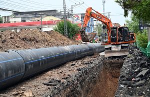 Deep Excavation Underway as workers install large water supply pipelines using heavey machinery on Saidpur Road.