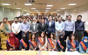 Vice Chancellor CUST Dr. Mansoor Ahmad presenting souvenir to Chief Guest Dr. Sultan Azam Temuri, former IGP Islamabad during a seminar “Cyber Security: The Next Defence Frontier” at Capital University of Science and Technology (CUST)