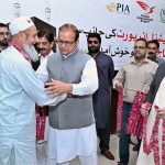 Minister of State for Development and Planning Chaudhry Armaghan Subhani, Chairman Sial Hassan Ali Bhatti welcomes the first and second flight pilgrims returning from Saudi Arabia at the Sialkot International Airport