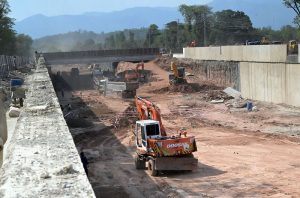 Heavy machinery is engaged in construction work at the Park Road underpass project in the Federal capital