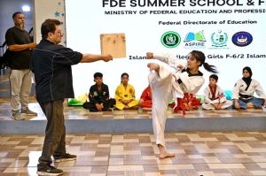 Students demonstrating their taekwondo skills during the Summer School & Fiesta 2026 at Islamabad College for Girls, F-6/2