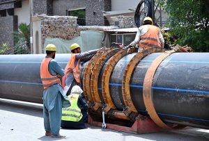 Workers are busy laying a huge water supply pipeline on Saidpur Road to improve the city's water distribution