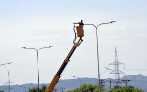 CDA electrician repairs street lights along the Islamabad Expressway to improve visibility and road safety for commuters at night time in the federal capital.