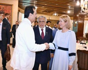 Former Prime Minister and Chairman Senate Syed Yousaf Raza Gilani shaking hand with the first female former Prime Minister of Astonia & EU High Representative Kaja Kallas in a luncheon.