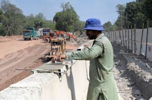 Heavy machinery is engaged in construction work at the Park Road underpass project in the Federal capital