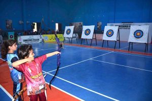 Young archers demonstrate their skills during the Commissioner Cup Faisalabad Division Archery Championship 2026 at Al-Fateh Sports Complex.