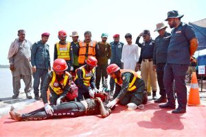 Rescue 1122 teams demonstrated emergency rescue and life-saving techniques during the third pre-flood preparedness mock exercise held at Head Muhammad Wala on the Chenab River.