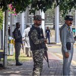 Security personnel are on alert outside the Parliament House amid tight security arrangements during the presentation of the Federal Budget 2026-27 in the National Assembly