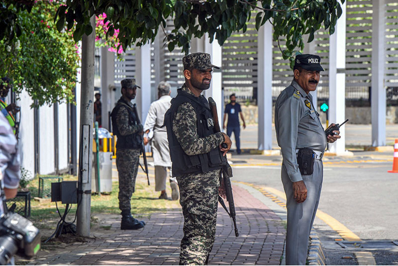 Security personnel are on alert outside the Parliament House amid tight security arrangements during the presentation of the Federal Budget 2026-27 in the National Assembly