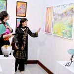 The art lovers showing interest in artwork on display during the inaugural ceremony of Offgrid studio's "Rejected" art Exhibition at PNCA