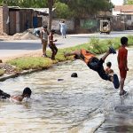 Youngsters enjoys bathing in Canal during hot weather