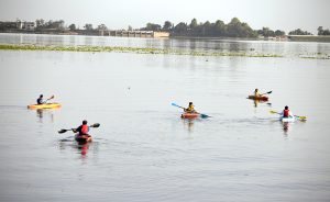 Tourists sail boats on the lake while enjoying a day out at Lake View Park in the Federal Capital.