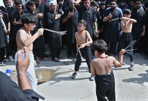 Mourners oozing themselves with knives and chains during main procession on 9th Muharramul Haram at G-6. Muharramul Harram known as the first month of the Islamic calendar and the mourning month in remembrance of the martyrdom (Shahadat) of Hazrat Imam Hussain (RA), the grandson of the Holy Prophet Mohammad (PBUH)