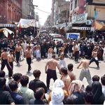 Mourners oozing themselves with knives and chains during procession on 10th of Holy Month of Muharramul Harram. Muharram is the mourning month in remembrance of the Shahadat of Hazrat Imam Hussain (RA), the Grandson of the Holy Prophet Mohammad (PBUH)