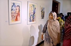 The art lovers showing interest in artwork on display during the inaugural ceremony of Offgrid studio's "Rejected" art Exhibition at PNCA