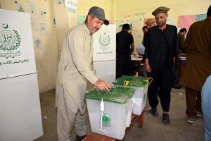 Election officials process ballot papers and verify voter credentials at a polling station during the Gilgit-Baltistan General Elections 2026.