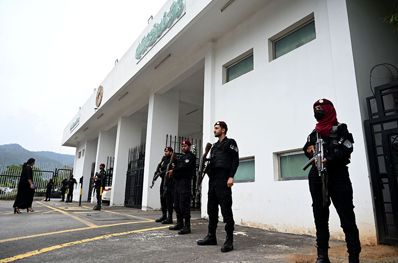 Security personnel maintain a close watch around Parliament House to ensure law and order during the Federal Budget 2026–27 session in the National Assembly in the federal capital