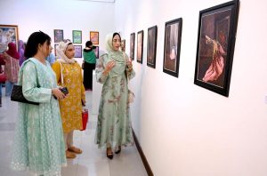 The art lovers showing interest in artwork on display during the inaugural ceremony of Offgrid studio's "Rejected" art Exhibition at PNCA