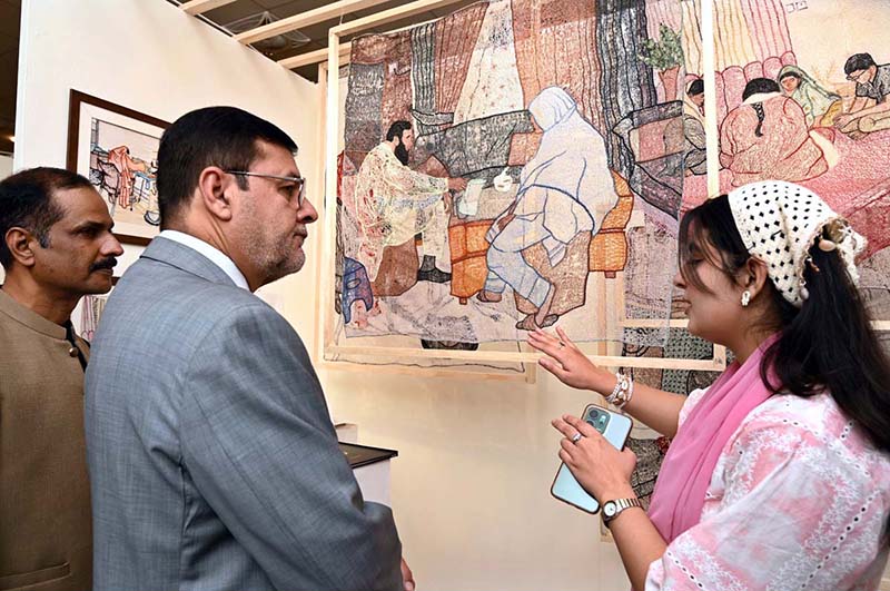 Vice Chancellor of the University of Sargodha, Prof. Dr. Qaiser Abbas, visits a textile design thesis exhibition and interacts with students showcasing their creative projects at the Department of Art and Design
