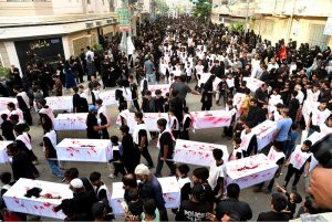 Mourners participate in the Soyem procession in remembrance of the martyrs of Karbala (Shuhada-e-Karbala), honoring the 72 loyal companions and family members of Hazrat Imam Hussain (AS) who sacrificed their lives on the Day of Ashura. The procession passes through various roads of the city