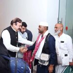 Federal Minister for Parliamentary Affairs Dr. Tariq Fazal Chaudhry welcomes Hajj pilgrims returning from Saudi Arabia at Islamabad Airport