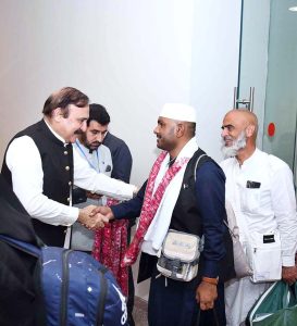 Federal Minister for Parliamentary Affairs Dr. Tariq Fazal Chaudhry welcomes Hajj pilgrims returning from Saudi Arabia at Islamabad Airport
