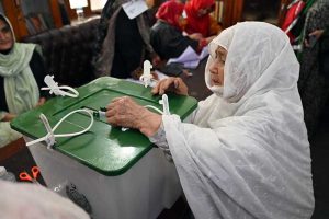 Election officials process ballot papers and verify voter credentials at a polling station during the Gilgit-Baltistan General Elections 2026.