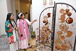Vice Chancellor of the University of Sargodha, Prof. Dr. Qaiser Abbas, visits a textile design thesis exhibition and interacts with students showcasing their creative projects at the Department of Art and Design