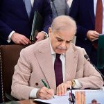 Prime Minister Muhammad Shehbaz Sharif signing Annual Budget 2026-27 documents after its approval by the Federal Cabinet meeting at Parliament House
