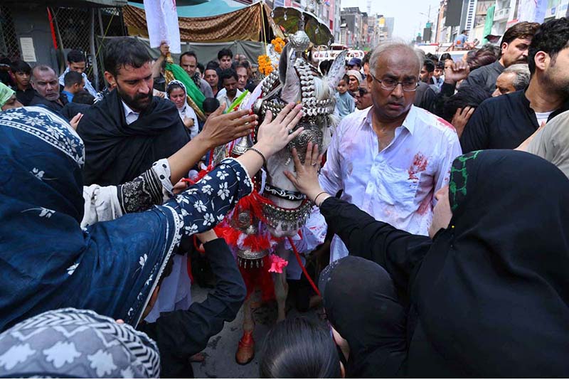 A large number of mourners attending the 9th Muharram Zuljinah procession passes through Saadar Road. Muharramul Haram is known as the first month of the Islamic calendar and the mourning month in remembrance of the martyrdom (Shahadat) of Hazrat Imam Hussain (RA), the grandson of the Holy Prophet Mohammad (PBUH)