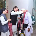 Federal Minister for Parliamentary Affairs Dr. Tariq Fazal Chaudhry welcomes Hajj pilgrims returning from Saudi Arabia at Islamabad Airport