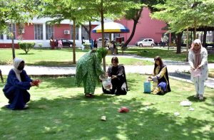 Female students at the University of Engineering and Technology (UET) Lahore collect plastic bottles and litter to promote environmental responsibility and raise awareness about keeping the campus clean and green on the occasion of World Environment Day.