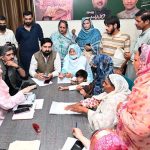 Federal Minister for Information and Broadcasting Attaullah Tarar's mother Sajida Farooq Tarar is listening to public affairs in his constituency NA-127