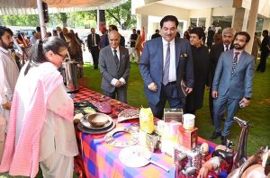 Former Foreign Minister, Engineer Khurram Dastagir Khan visiting stalls at the inaugural ceremony of the Centre for Afghanistan, Middle East & Africa (CAMEA) Celebration "Africa Day 2026" at Institute of Strategic Studies Islamabad (ISSI)