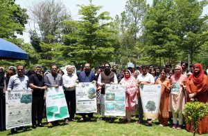 Female students at the University of Engineering and Technology (UET) Lahore collect plastic bottles and litter to promote environmental responsibility and raise awareness about keeping the campus clean and green on the occasion of World Environment Day.
