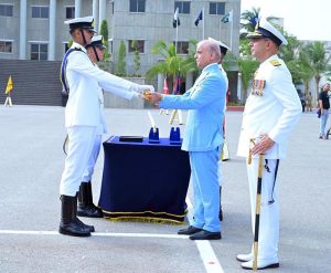 Prime Minister Muhammad Shehbaz Sharif handing over the flag to the high achieving company during the term at the passing out ceremony of 125th Midshipmen and 33rd SSC courses at Pakistan Naval Academy, PNS Rahbar