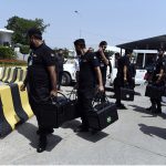 Police commandos and officials from Pakistan's Federal Board of Revenue (FBR) were seen shifting physical boxes containing copies of the FY2026–27 federal budget into Parliament House in Islamabad