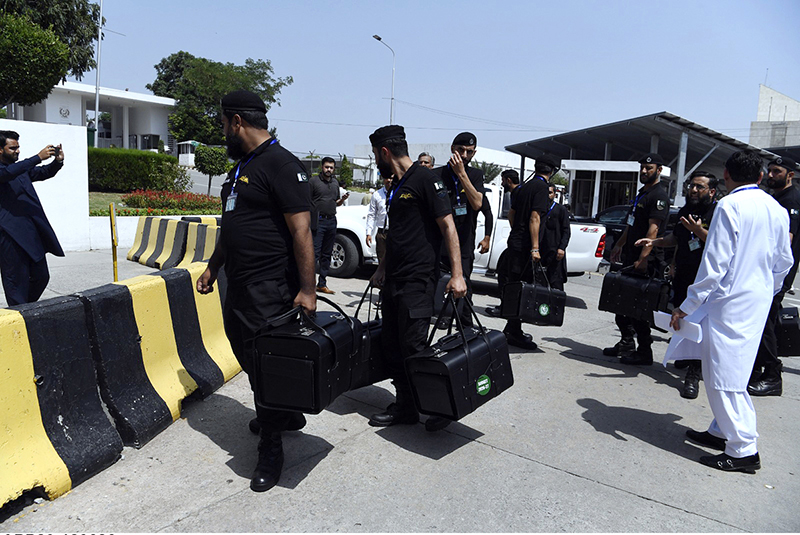 Police commandos and officials from Pakistan's Federal Board of Revenue (FBR) were seen shifting physical boxes containing copies of the FY2026–27 federal budget into Parliament House in Islamabad