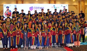 Chairman Senate of Pakistan Syed Yousaf Raza Gillani awards a distinction-holding graduate during the Annual Convocation 2026 of the College of Tourism and Hotel Management (COTHM) at a local hall.