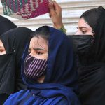 Women mourners attending the main Ashura procession on 10th of Holy Month of Muharram-ul-Harram at Ghanta Ghar Chowk. Muharram, the first month of the Islamic calendar, is observed as a month of mourning in remembrance of the martyrdom (Shahadat) of Hazrat Imam Hussain (RA), the grandson of the Holy Prophet Muhammad (PBUH)