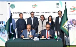 Mohiyuddin Ahmad Wani, President of the Pakistan Hockey Federation, signs a Memorandum of Understanding (MoU) between the Pakistan Hockey Federation and Pakistan Arab Refinery Company (PARCO) during a signing ceremony held at Naseer Bunda Hockey Stadium in the Pakistan Sports Complex.