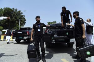 Police commandos and officials from Pakistan's Federal Board of Revenue (FBR) were seen shifting physical boxes containing copies of the FY2026–27 federal budget into Parliament House in Islamabad