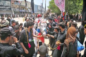A large number of mourners attending Tazia procession on 10th of Holy Month of Muharram-ul-Harram. Muharram is the mourning month in remembrance of the Shahadat of Hazrat Imam Hussain (RA), the Grandson of the Holy Prophet Mohammad (PBUH)