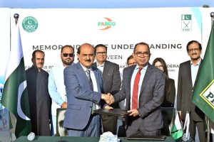 Mohiyuddin Ahmad Wani, President of the Pakistan Hockey Federation, signs a Memorandum of Understanding (MoU) between the Pakistan Hockey Federation and Pakistan Arab Refinery Company (PARCO) during a signing ceremony held at Naseer Bunda Hockey Stadium in the Pakistan Sports Complex.