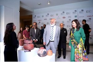 Prof. Dr. Niaz Ahmad Akhtar (S.I.), Chairman of the Higher Education Commission (HEC) visit stalls with Vice Chancellor Prof. Hina Tayyaba Khalil during the Thesis Display 2026 at Pakistan Institute of Fashion and Design (PIFD)