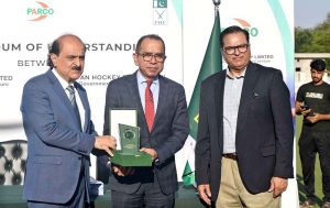 Mohiyuddin Ahmad Wani, President of the Pakistan Hockey Federation, signs a Memorandum of Understanding (MoU) between the Pakistan Hockey Federation and Pakistan Arab Refinery Company (PARCO) during a signing ceremony held at Naseer Bunda Hockey Stadium in the Pakistan Sports Complex.
