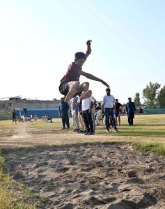 An athlete participates in the long jump event during the Inter-District Athletics Championship organized by the Divisional Sports Department at the Sports Stadium.