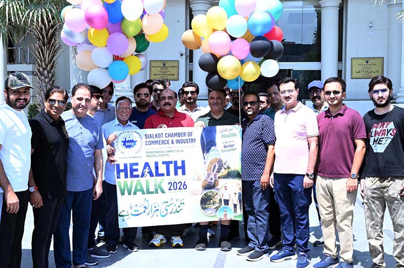 Business community leader Sheikh Riazuddin and President of the Sialkot Chamber of Commerce and Industry Syed Ehtesham Mazhar Gilani lead the Health Walk 2026