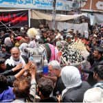 A large number of mourners attending the procession on 9th of the Holy Month of Muharramul Haram passing through Mumtazabad. Muharramul Haram is known as the first month of the Islamic calendar and the mourning month in remembrance of the martyrdom (Shahadat) of Hazrat Imam Hussain (RA), the grandson of the Holy Prophet Mohammad (PBUH)